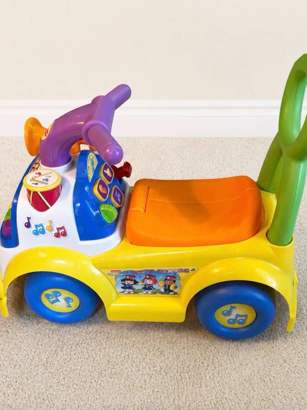 Fisher-Price Yellow, Orange, Purple & Blue Push Ride-On Vehicle